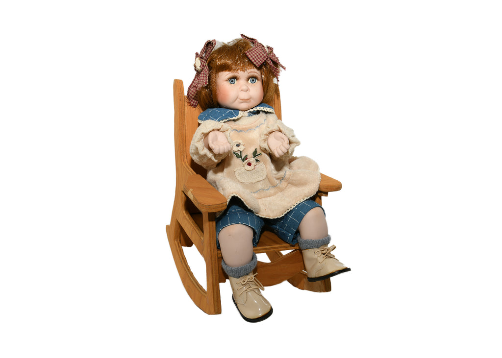 Doll In Rocking Chair