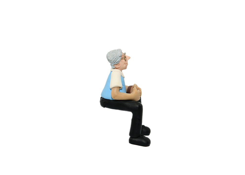 Man Sitting With Watch On-Figurine