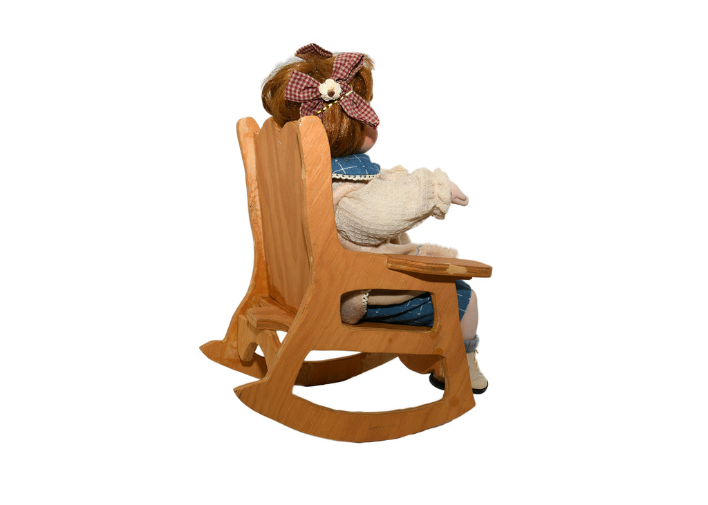 Doll In Rocking Chair