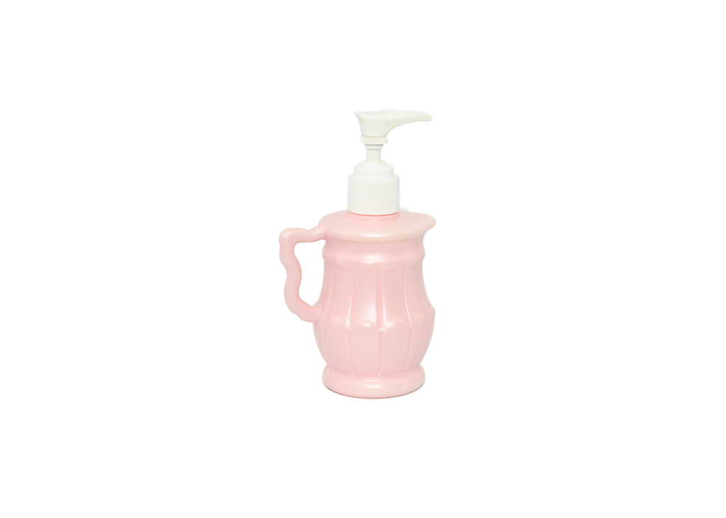 Avon-Pink Lotion Pitcher