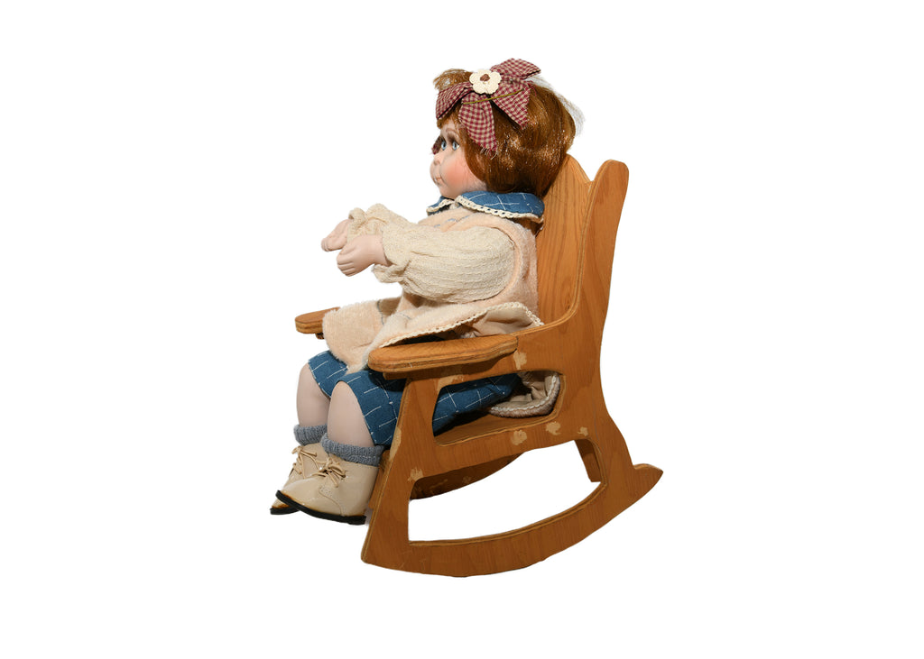 Doll In Rocking Chair